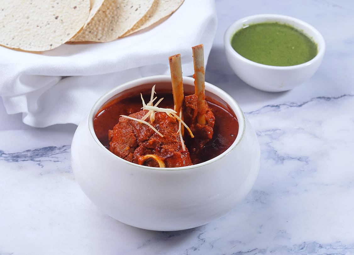 Restrained luxury hotel fine dining — supporting dish in this style