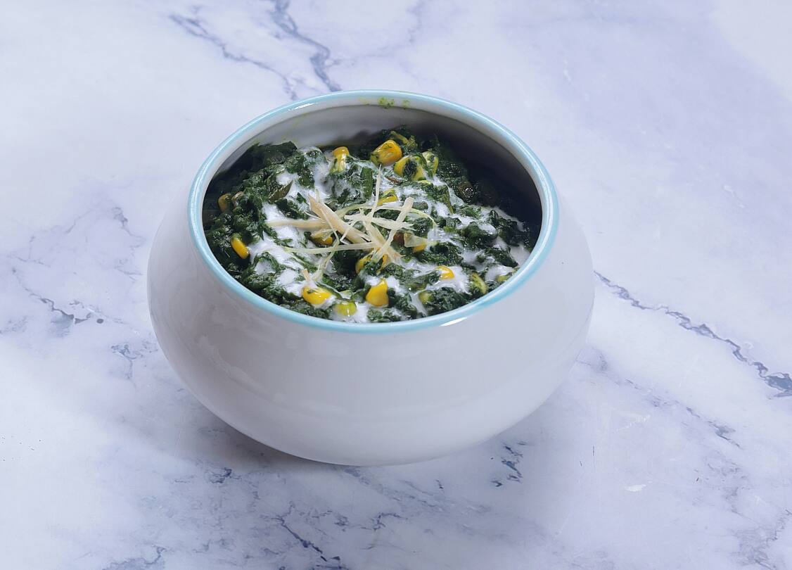 Restrained luxury hotel fine dining — supporting dish in this style